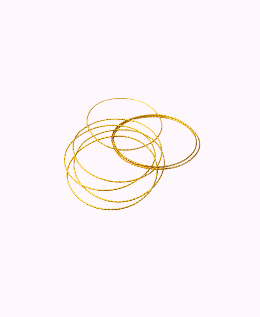 Bracciale Rigido Multicerchi in Ottone