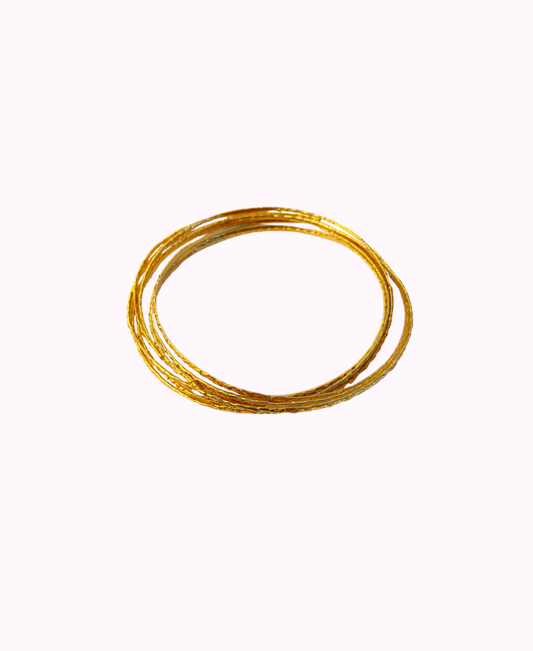 Bracciale Rigido Multicerchi in Ottone